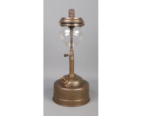 A brass Tilley oil lamp featuring glass shade and 'pork-pie' base.  