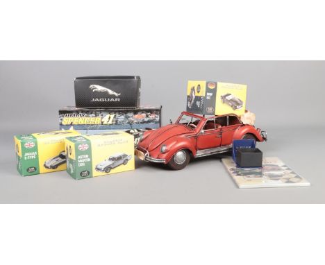 A collection of diecast and other vehicles including Jimmy Spencer 41 energizer car, Atlas Edition classic sports cars, Jagua