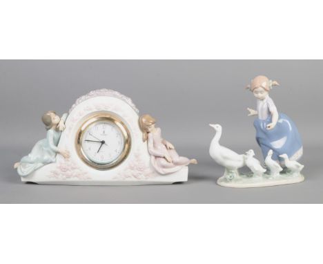 Two pieces of Lladro ceramics, 'Two Sisters' mantle clock and 'Hurry Now' geese and girl figure group.  Missing stick in Hurr
