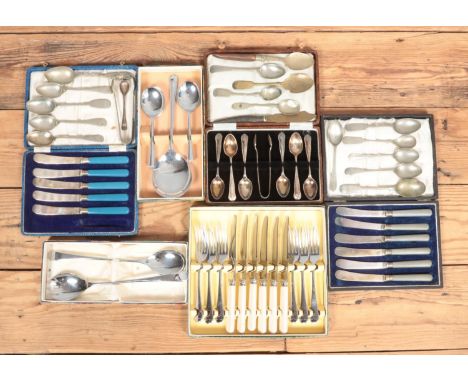 A collection of EPNS and silver plate flatware, mostly boxed. Includes coffee spoons and sugar tongs set, knives and forks se