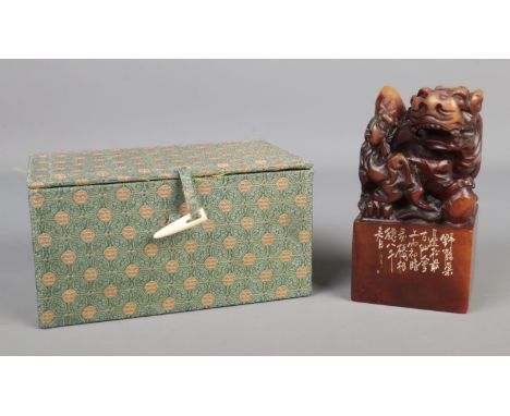 A large Chinese soapstone chop wax seal stamp with hand carved Foo dog and pup to top in original presentation box.Hx15cm Wx8