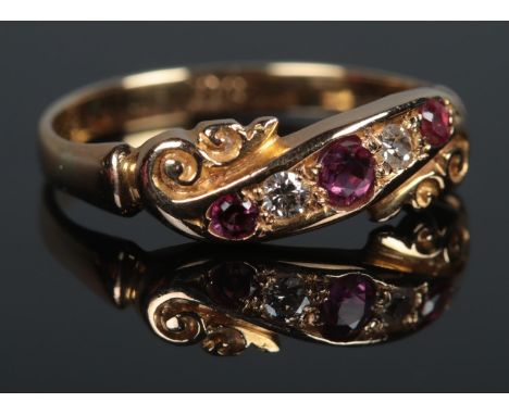 An Edwardian 18ct Gold, Ruby and Diamond five stone ring. Size L. Total weight: 2.6g  