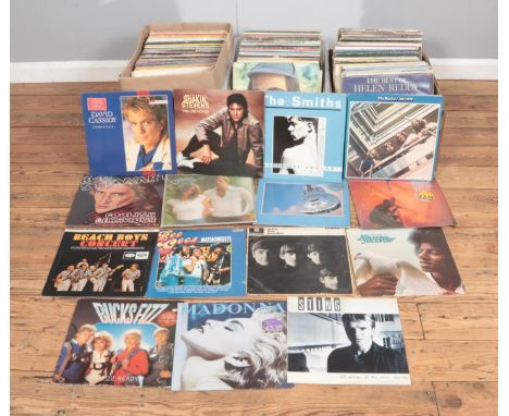 Three boxes of albums to include mostly record albums including Carpenters, Dire Straits,U2, Michael Jackson, The Beatles, Be