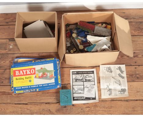 A box of assorted Meccano along with a Bayko Building outfit with original box.  Bayko box is very damaged.
