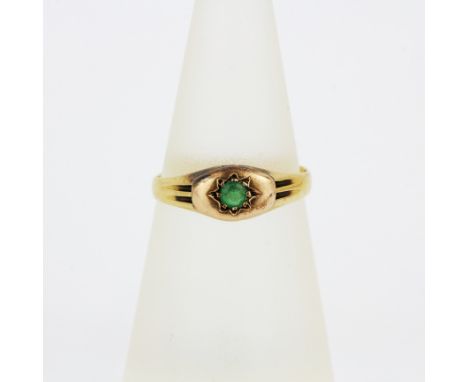 A yellow metal (tested minimum 9ct gold) ring set with an emerald, (L.5).