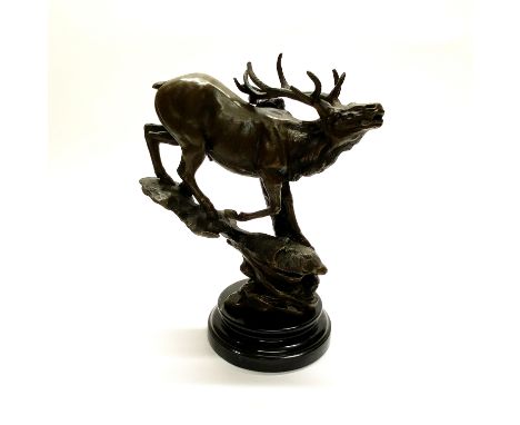An impressive bronze stag on a marble base. H. 29cm