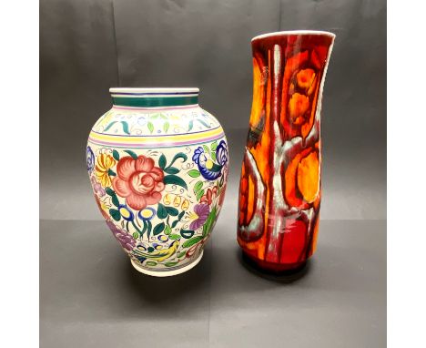 A large Poole pottery vase with orange poole pottery vase H. 40cm( A/F ) H. 34cm.