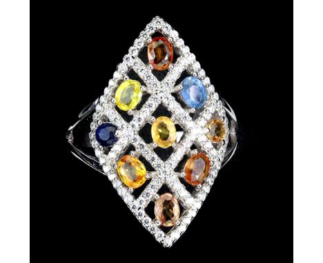 A 925 silver ring set with sapphires and fancy colour sapphires, ring size O.5.