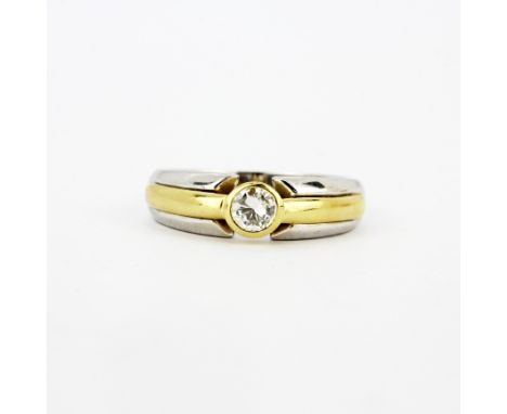 An 18ct white and yellow gold diamond solitaire ring, estimated approx. 0.33ct, (R), gross weight approx. 5.3gr.&nbsp;