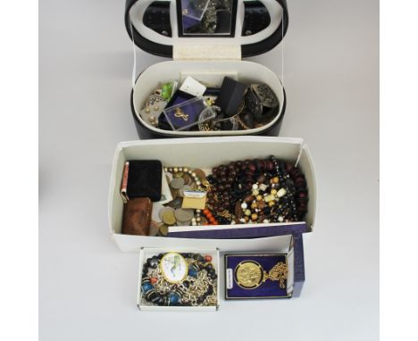 A jewellery case and contents with a further box of jewellery.