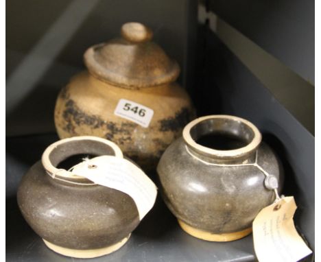 An early pottery container, W. 17cm (probably Neolithic) together with two glazed pottery jars.