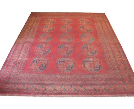 ANTIQUE AFGHAN BASHIR CARPET, 365cm x 315cm, turkomen design of repeat tribal guls inside multiple borders.