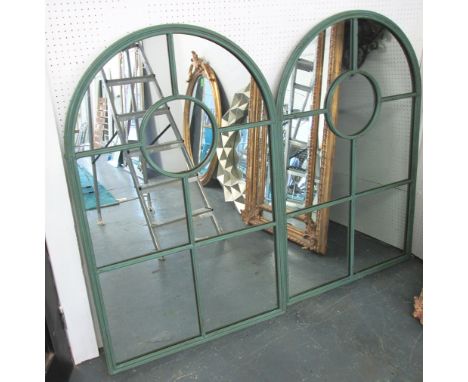 MIRRORS, a pair, architectural style with arched top in a painted metal frame, 122cm x 78cm. (2)