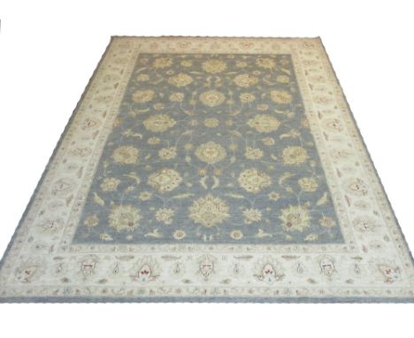 AFGHAN ZIEGLER CARPET, 385cm x 270cm, all over palmette and vine design on a jade field within a repeat palmette ivory border