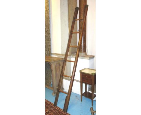 LIBRARY LADDER, rare 19th century studded leather and wood of hinged retractable design, 207cm H.
