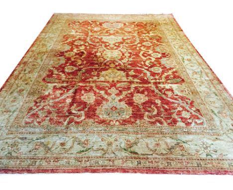 AFGHAN ZIEGLER CARPET, 423cm x 297cm, all over palmette and stylised vine design within multiple corresponding guard stripes 