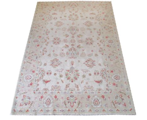 FINE PERSIAN TABRIZ DESIGN CARPET, 250cm x 172cm, all over palmette and scrolling vines on an ivory field within correspondin