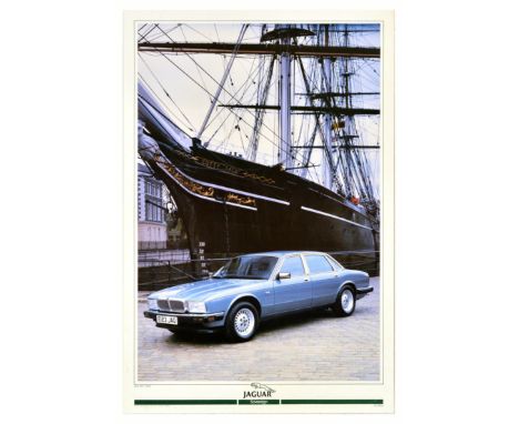 Original vintage advertising poster for the Jaguar Sovereign model featuring a photograph of the car parked in front of Cutty