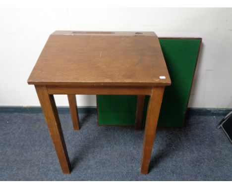 A mid century school desk together with a card table 