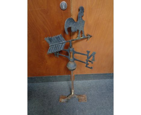 A cast iron cockerel weather vane 