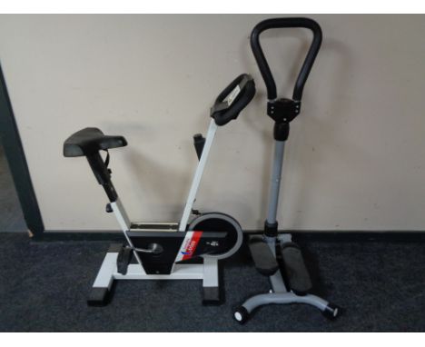 A Taarnby trim exercise bike with manual stepper 