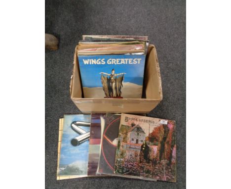 A collection of 25 vinyl L.P. records - Black Sabbath by Black Sabbath, Meaty Beaty Big &amp; Bouncy by the Who, In the Absen