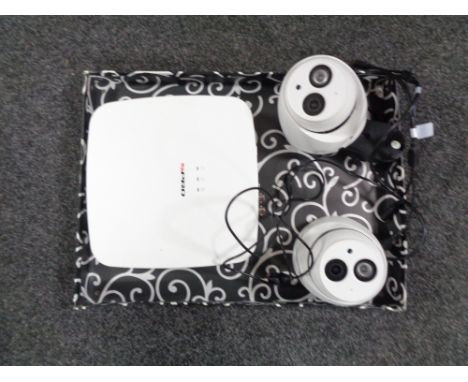 An S-pro digital video recorder together with two security cameras 