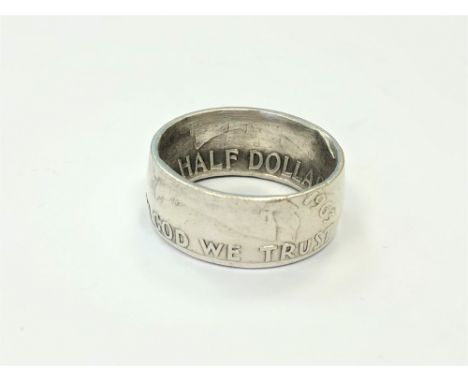 An American half dollar 1963 ring, size P