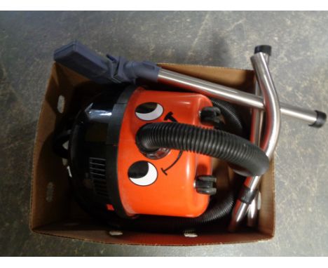 A Henry vacuum with tools 
