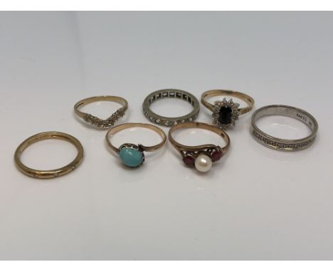 Seven gold gem set rings including ruby, diamond, turquoise etc CONDITION REPORT: 12.1g
