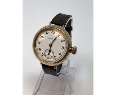 A large gold trench wristwatch by Mappin, solid Dennison case hallmarked 1919 CONDITION REPORT: Winds and runs