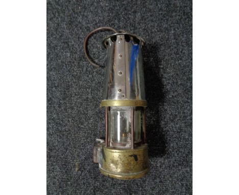 A brass and chrome vintage miner's lamp 