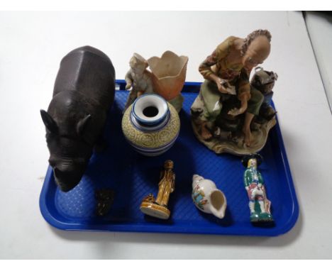 A tray of Wade figure - Danny boy, crested Whitley Bay shell, Capo di Monte figure -Tinker etc 