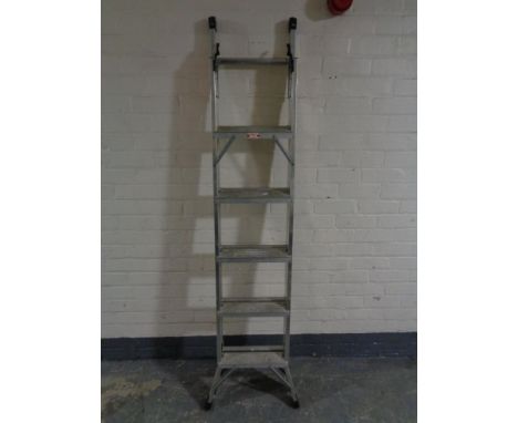 An aluminium three way ladder 
