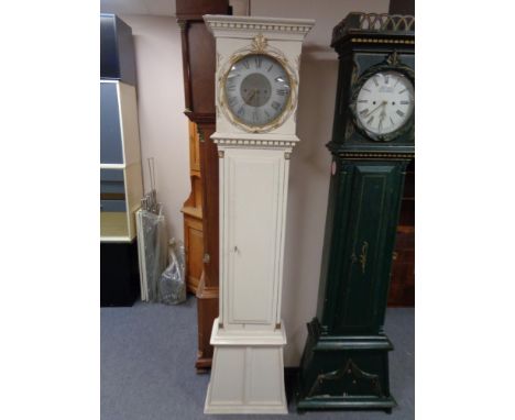 An early twentieth century painted continental longcase clock with circular silvered dial, pendulum and weights 