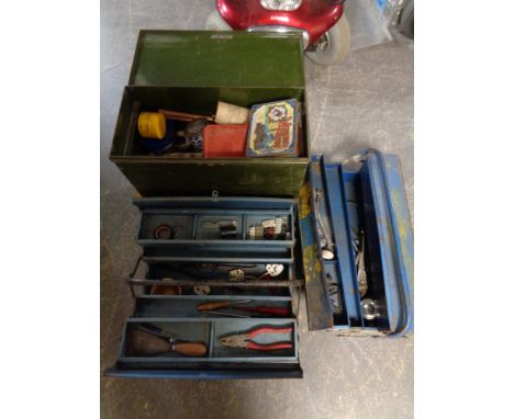 Two metal concertina tool boxes together with two further metal boxes containing hand tools, hardware etc 