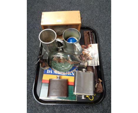 A tray of hip flasks, ship in Dimple bottle, Rob Myers mixed Media Velocopig sculpture in case, recorder, tankards etc 