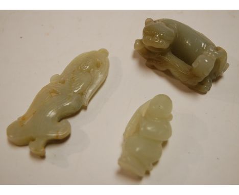 A carved jade pendant in the form of a lady; together with two other jade carvings (3)