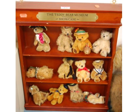 A collection of Danbury Mint 'The Teddy-bear Museum Showcase Figures', with matching shelf and certificate; together with var