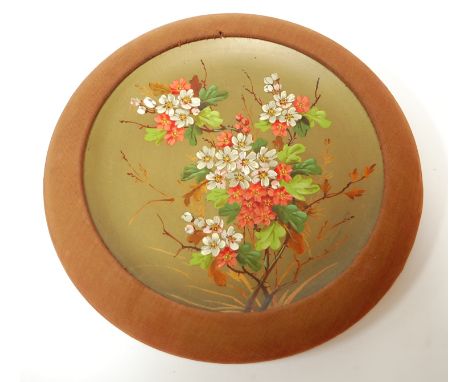 A circa 1900 Watcombe Torquay pottery charger handpainted with flowers within a fabric surround
