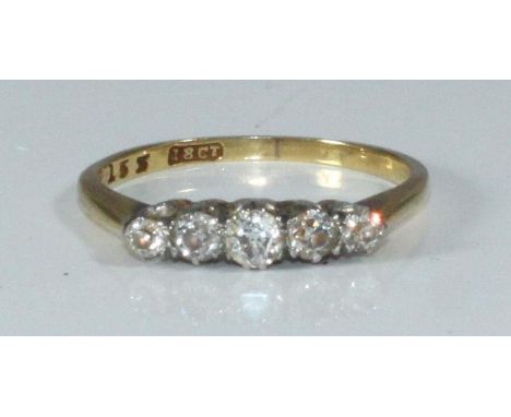 An 18ct gold five-stone diamond ring, estimated total diamond weight 0.40 carats, 2.5 grams 