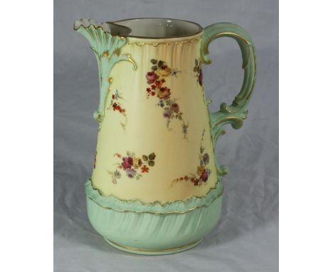 Royal Worcester porcelain water jug of tapering cylindrical form with leaf-moulded spout and base, scroll work handle and pol