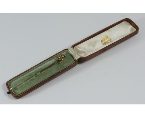 A 15ct gold and seed pearl stick pin in fitted retail box 