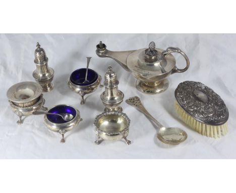 A silver oil lamp together with two pairs of silver salts, pair of peppers, brush and spoons etc 
