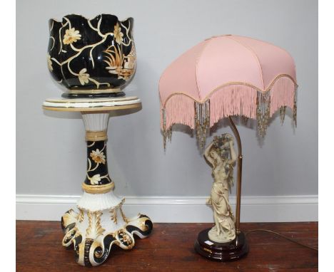 A 20th century Italian Jardiniere, black with cream flowers and gold rim, 86cm high together with Guiseppe Armani table lamp 