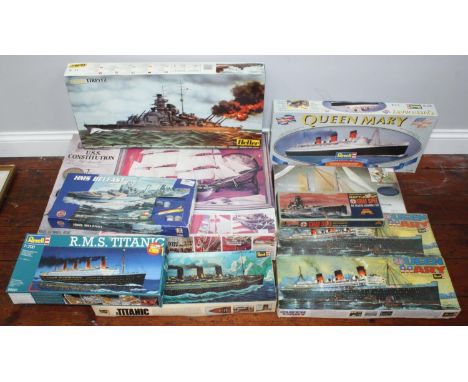 Ten unmade scale kit model ships and boats including Revell USS Constitution 91x68cm, Titanic, Graf Spee, HMS Belfast Heller 