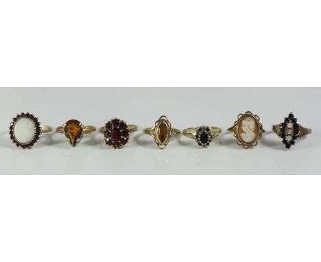 Seven various 9ct gold rings, variously set with cameo, garnet, opal etc, 22.10 grams gross 