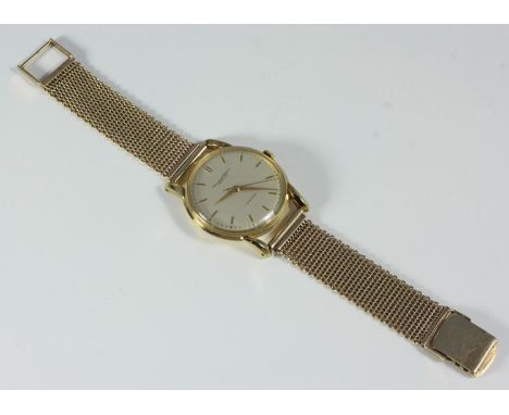 A late 1950s vintage gentlemen's IWC (International Watch Co) dress watch, 18ct gold plain circular case with Automatic movem