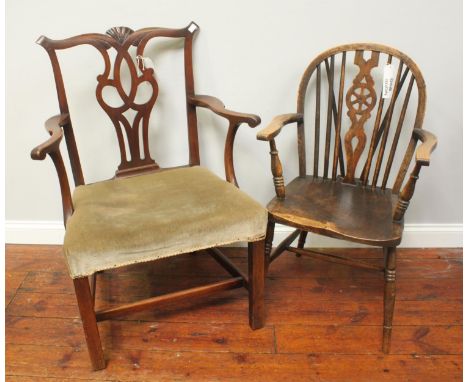 An 18th century mahogany carver chair in the Chippendale style with shell capped crest rail, together with an oak armchair wi