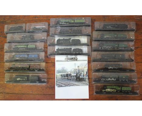 Eighteen various static scale model steam locomotives and accompanying info binder of 'Great Locomotives' 